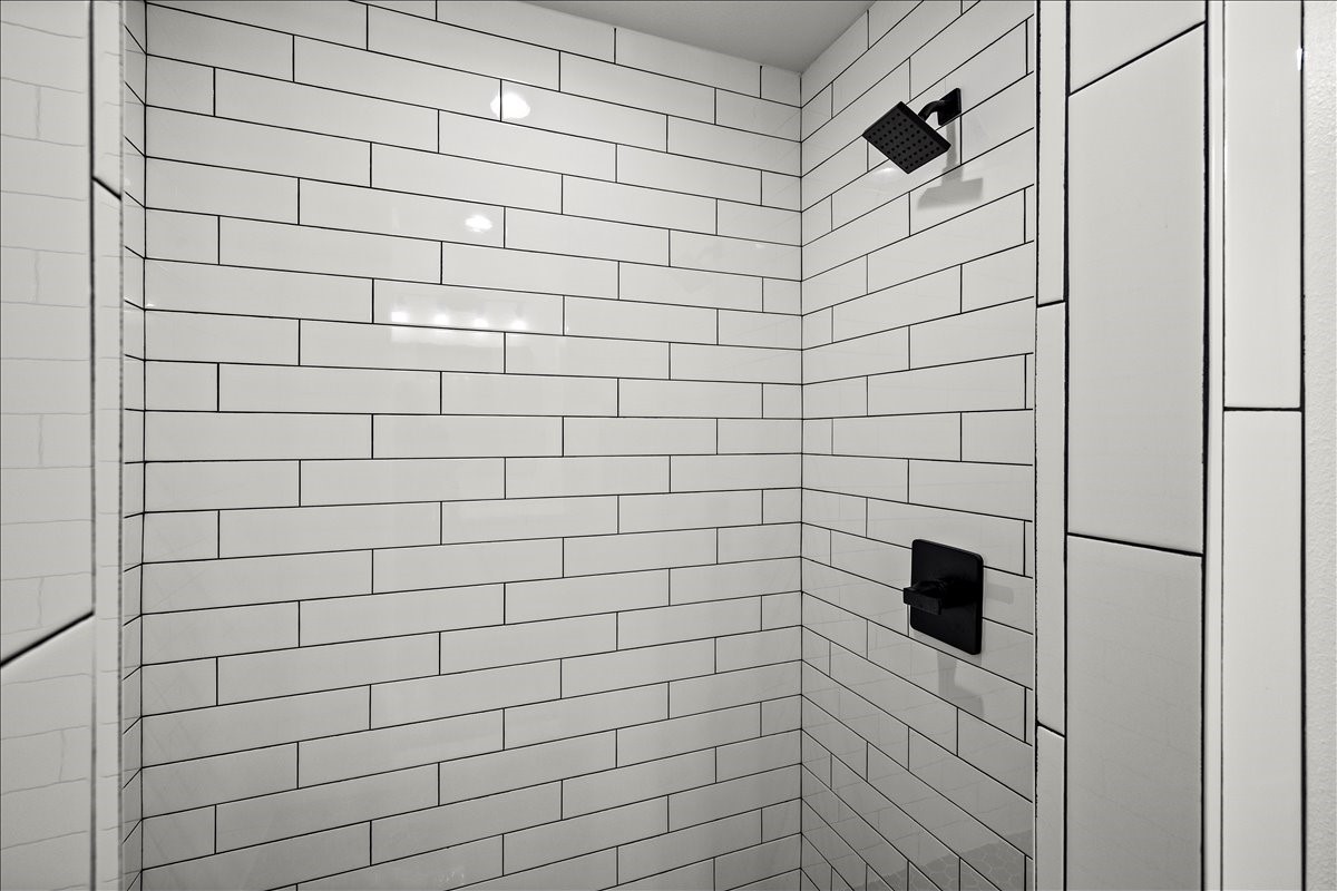 14103 3rd Street Santa Fe, TX 77517 - Photo 24 of 46 a bathroom with a shower