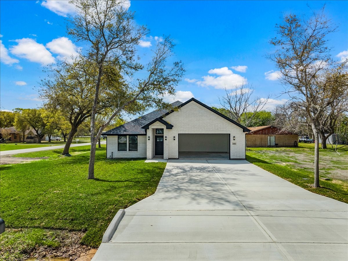 14103 3rd Street Santa Fe, TX 77517 - Photo 36 of 46 a view of house with a yard