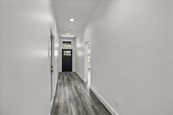 a kitchen with a stove and a microwave