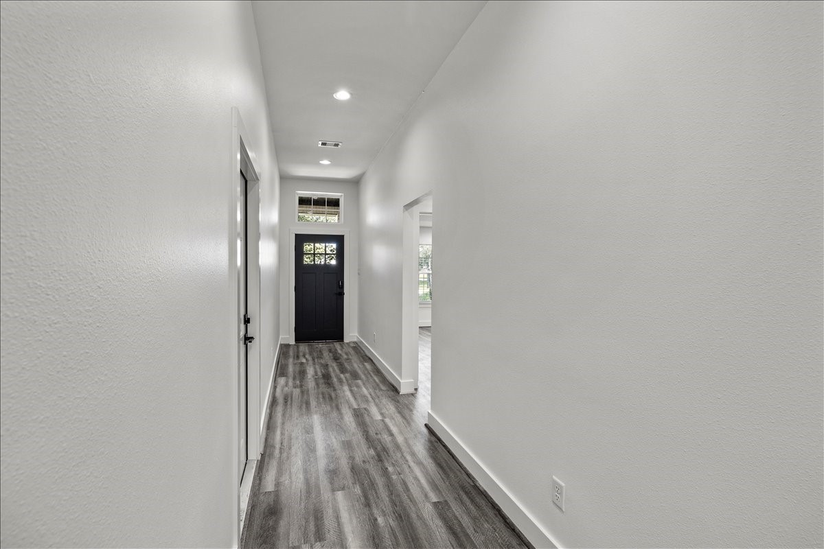 14103 3rd Street Santa Fe, TX 77517 - Photo 7 of 46 a view of hallway with wooden floor