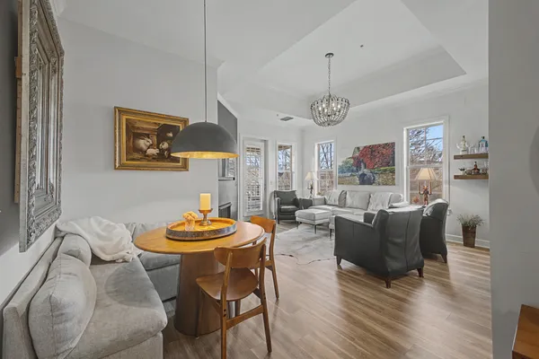 a dining room with furniture and window