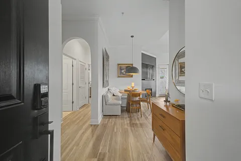 a kitchen with stainless steel appliances a refrigerator and a stove