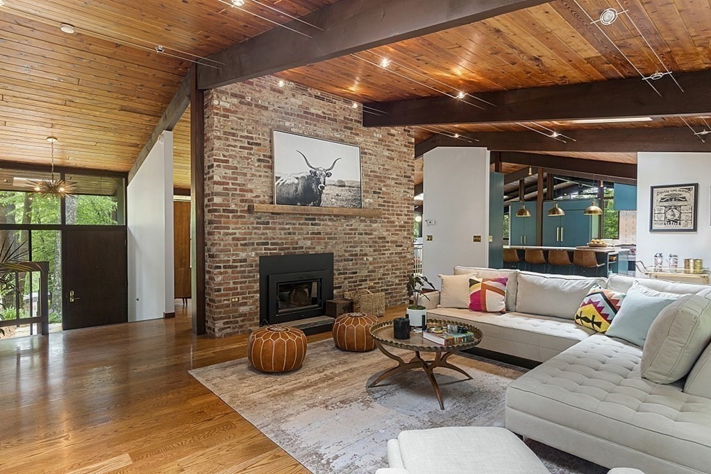 127 Commerford Road Concord, MA 01742 - Photo 12 of 33 a living room with furniture and a fireplace