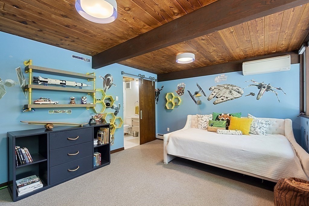 127 Commerford Road Concord, MA 01742 - Photo 20 of 33 a bedroom with a bed and a dresser