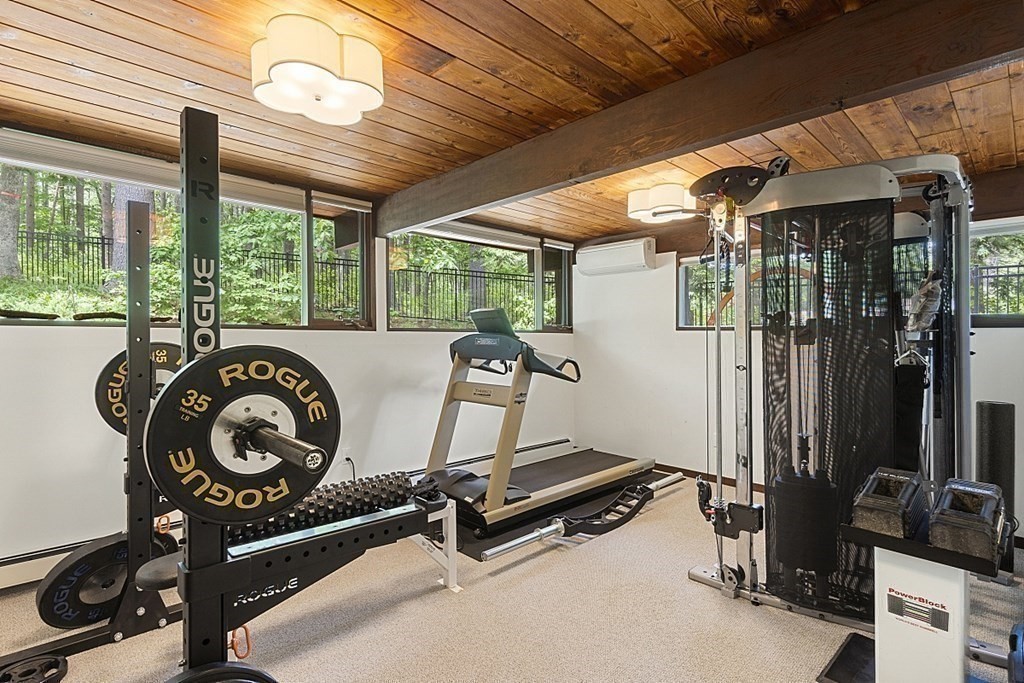 127 Commerford Road Concord, MA 01742 - Photo 22 of 33 a view of a room with gym equipment
