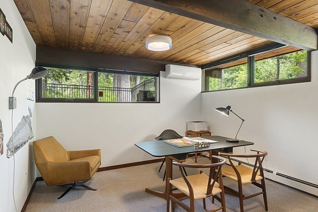 127 Commerford Road Concord, MA 01742 - Photo 23 of 33 a view of a dining room with furniture and a window