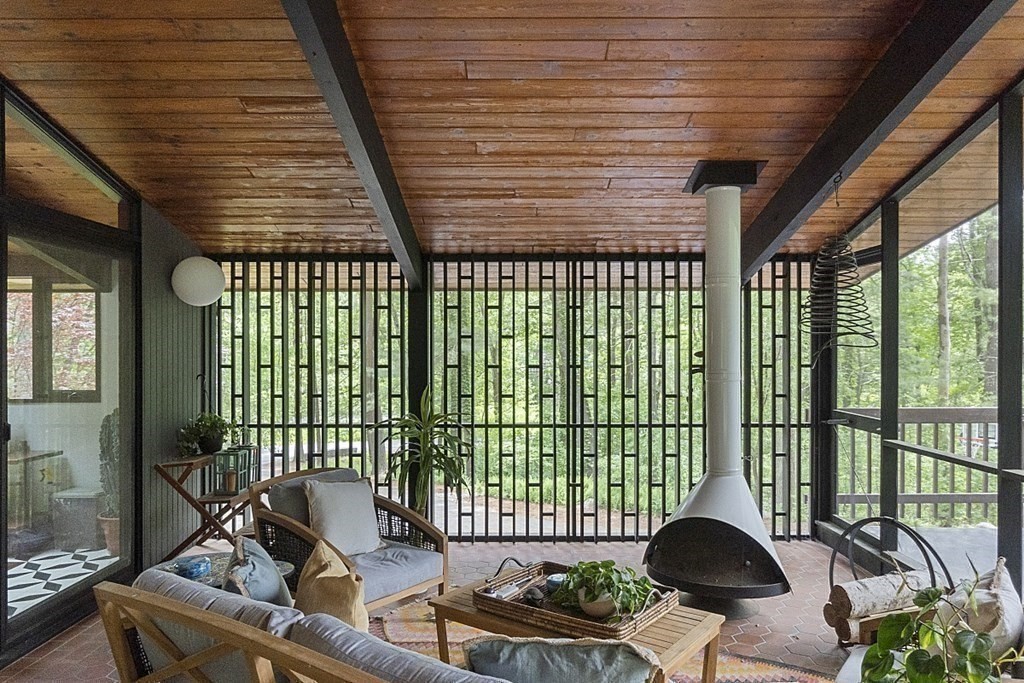 127 Commerford Road Concord, MA 01742 - Photo 26 of 33 a building outdoor space with patio furniture