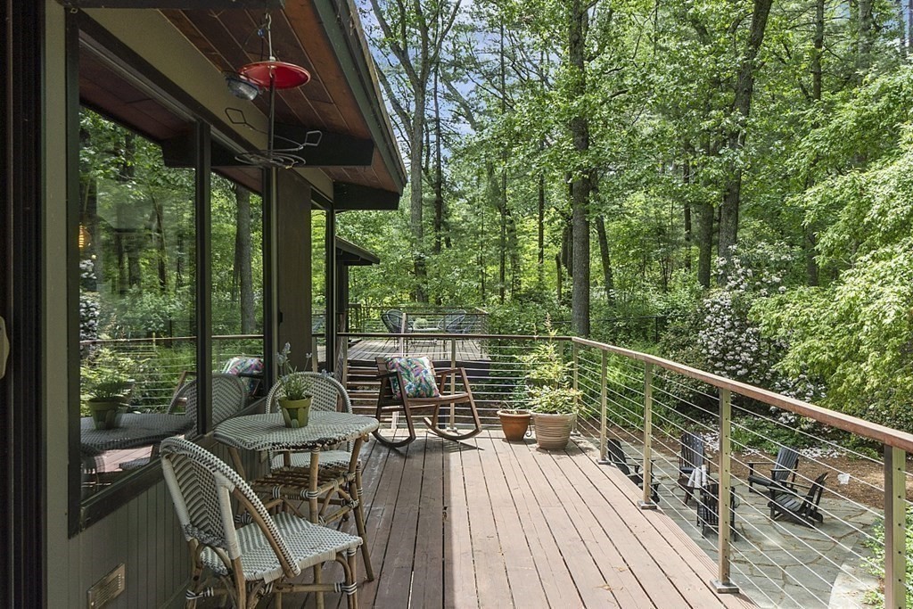 127 Commerford Road Concord, MA 01742 - Photo 28 of 33 a view of balcony with furniture and wooden floor