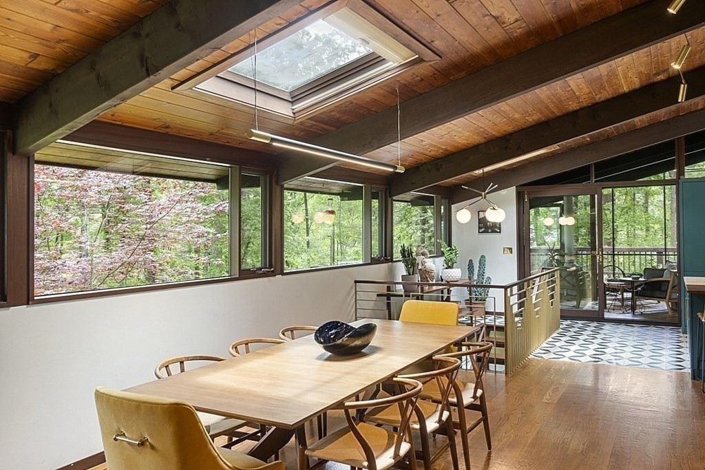 127 Commerford Road Concord, MA 01742 - Photo 5 of 33 a view of a dining room with furniture window and outside view