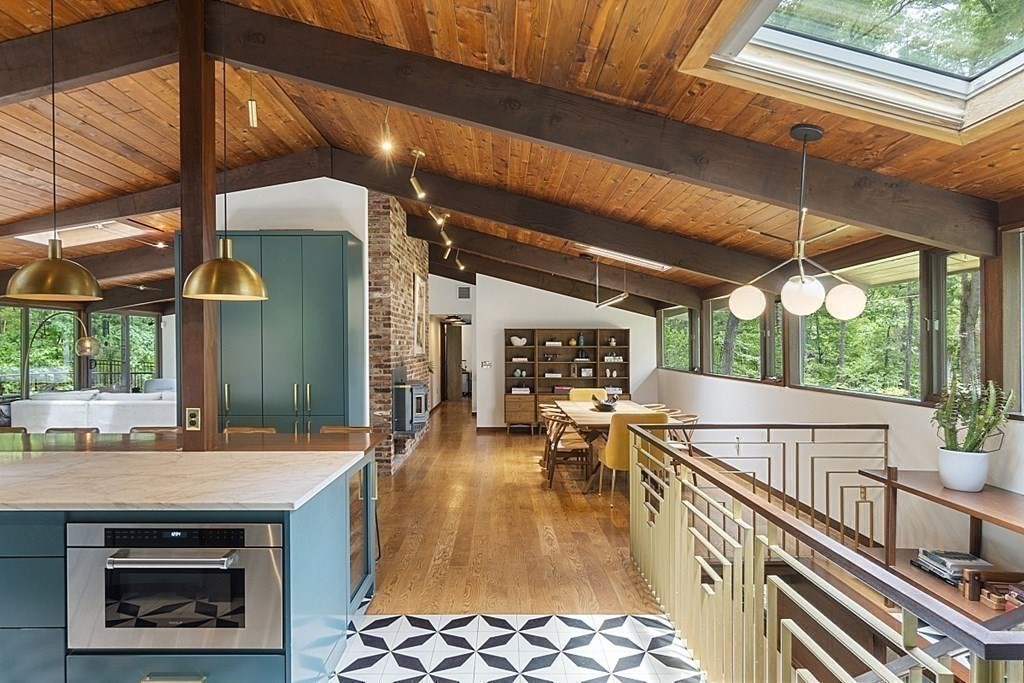 127 Commerford Road Concord, MA 01742 - Photo 6 of 33 a view of a chairs and table in the balcony