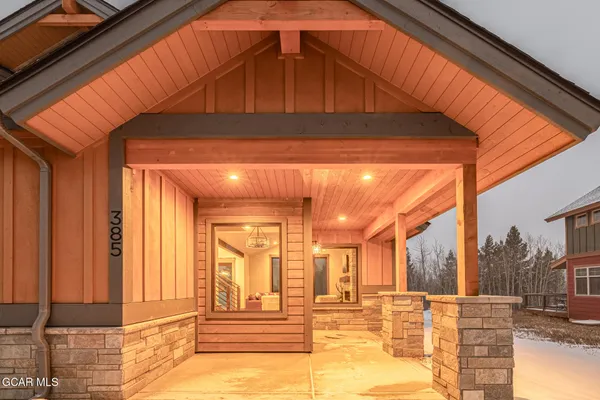 a view of a city street with tall buildings
