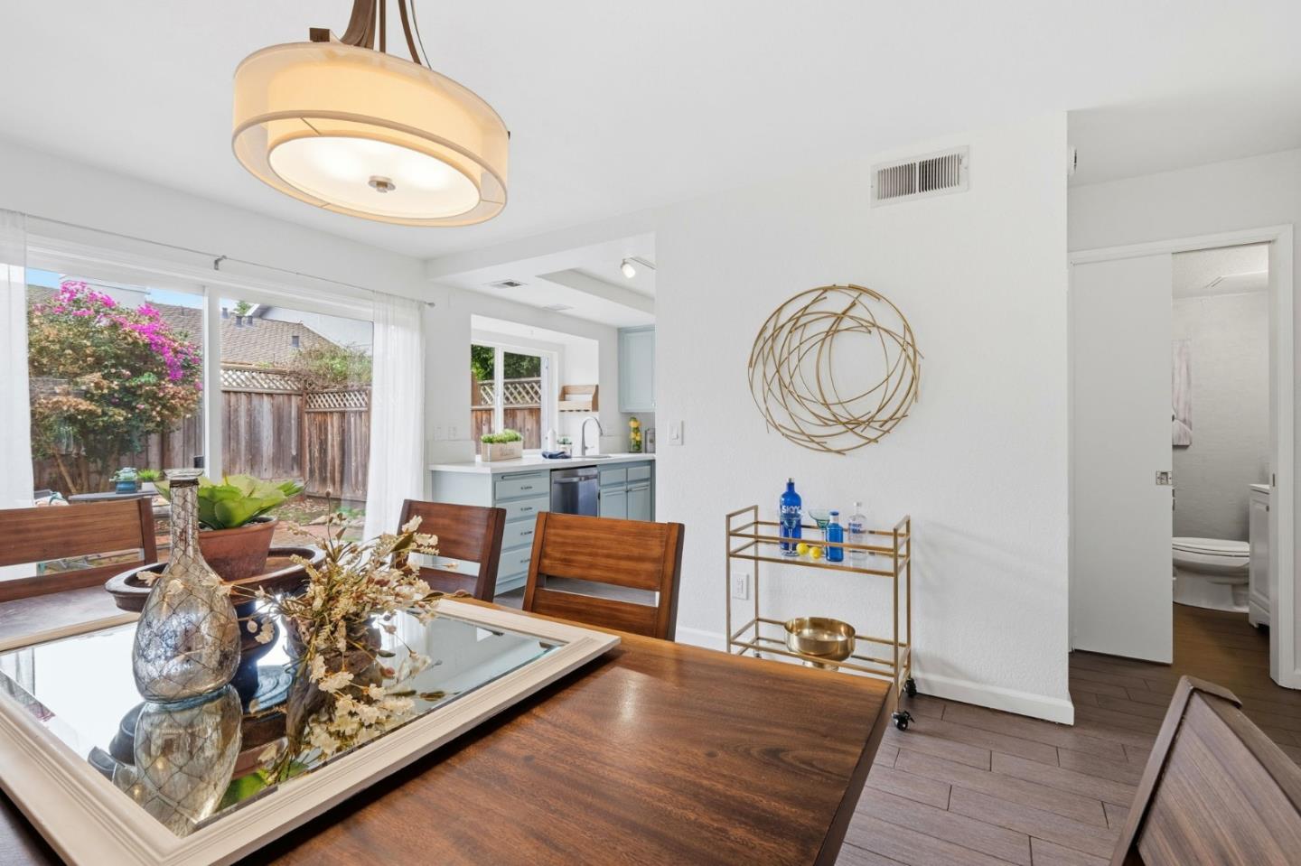 283 Perch Way Aptos, CA 95003 - Photo 14 of 37 a living room with fireplace furniture and a large window