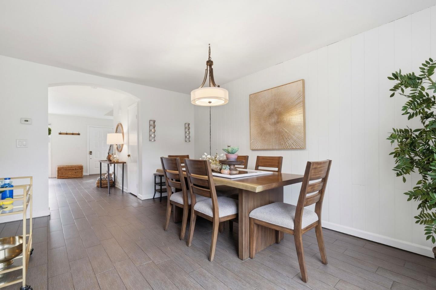 283 Perch Way Aptos, CA 95003 - Photo 17 of 37 a view of a dining room with furniture and wooden floor