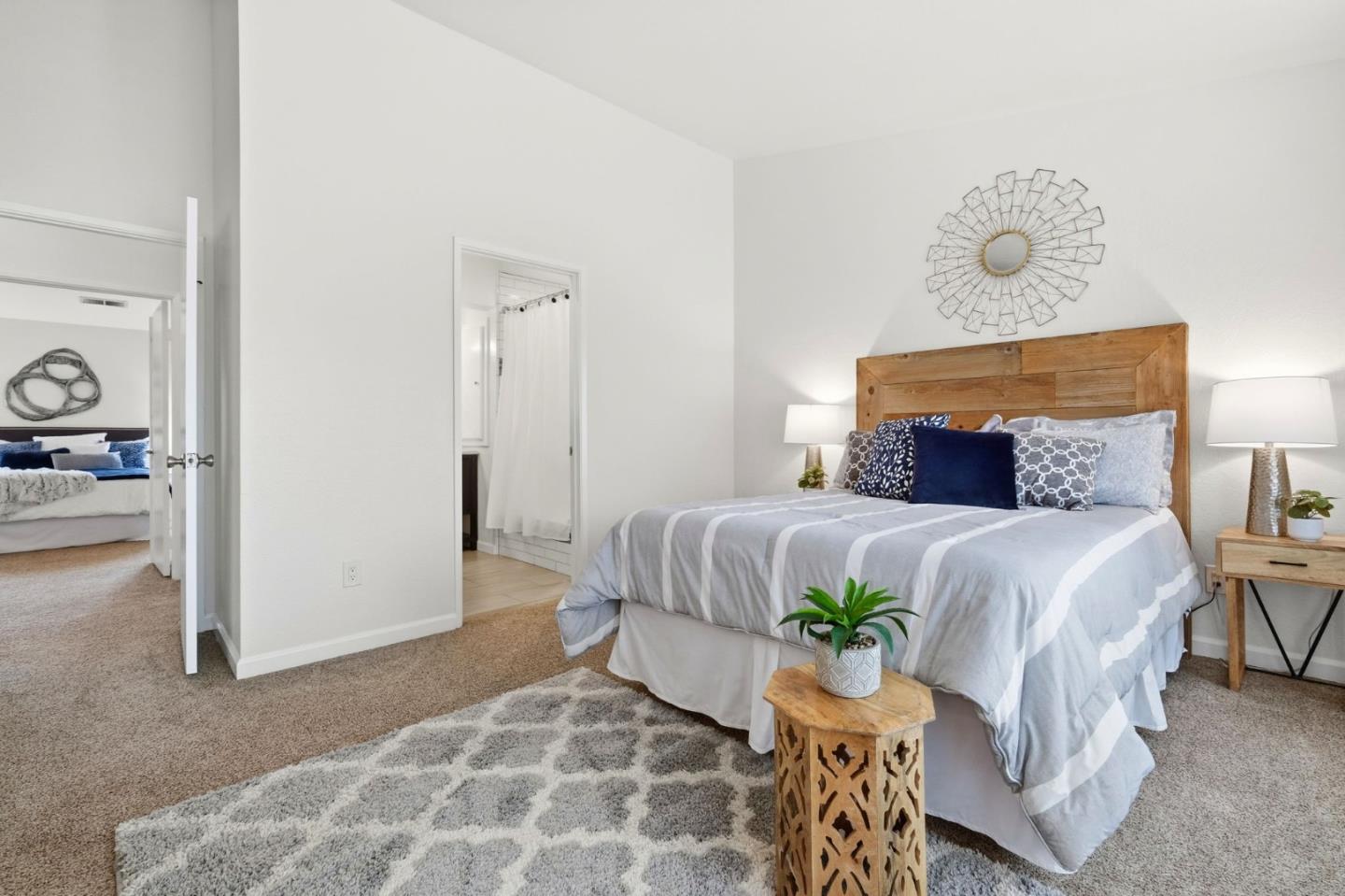 283 Perch Way Aptos, CA 95003 - Photo 24 of 37 a bedroom with a bed and painting on the wall