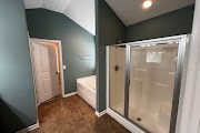 4557 Ivy Patch Drive Fortson, GA 31808 - Photo 16 of 27 a bathroom with a shower and a sink