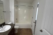 4557 Ivy Patch Drive Fortson, GA 31808 - Photo 22 of 27 a bathroom with a sink a toilet and shower
