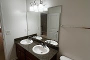 4557 Ivy Patch Drive Fortson, GA 31808 - Photo 23 of 27 a bathroom with a sink and a mirror