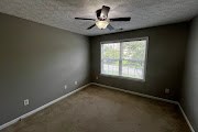 4557 Ivy Patch Drive Fortson, GA 31808 - Photo 27 of 27 an empty room with a window