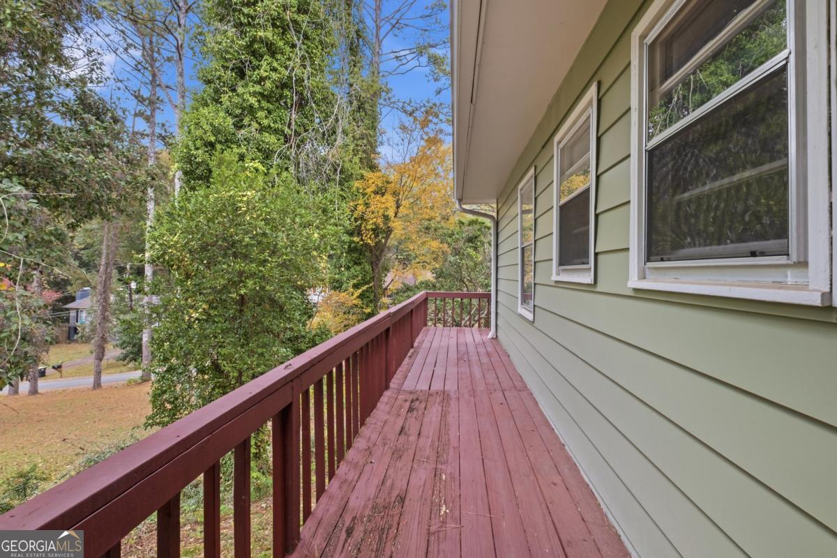 14 Mitchell Circle Rome, GA 30161 - Photo 3 of 39 a view of a balcony with wooden floor and fence
