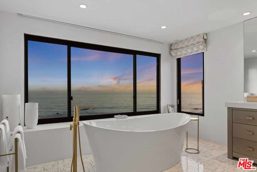 24146 Malibu Road Malibu, CA 90265 - Photo 14 of 26 a view of a living room with a large window