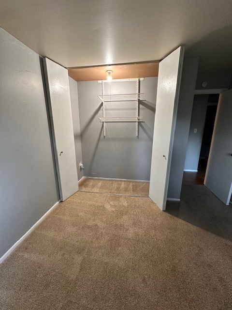 745 Hill Drive, Unit 314 Hoffman Estates, IL 60169 - Photo 5 of 8 a view of empty room with wooden floor