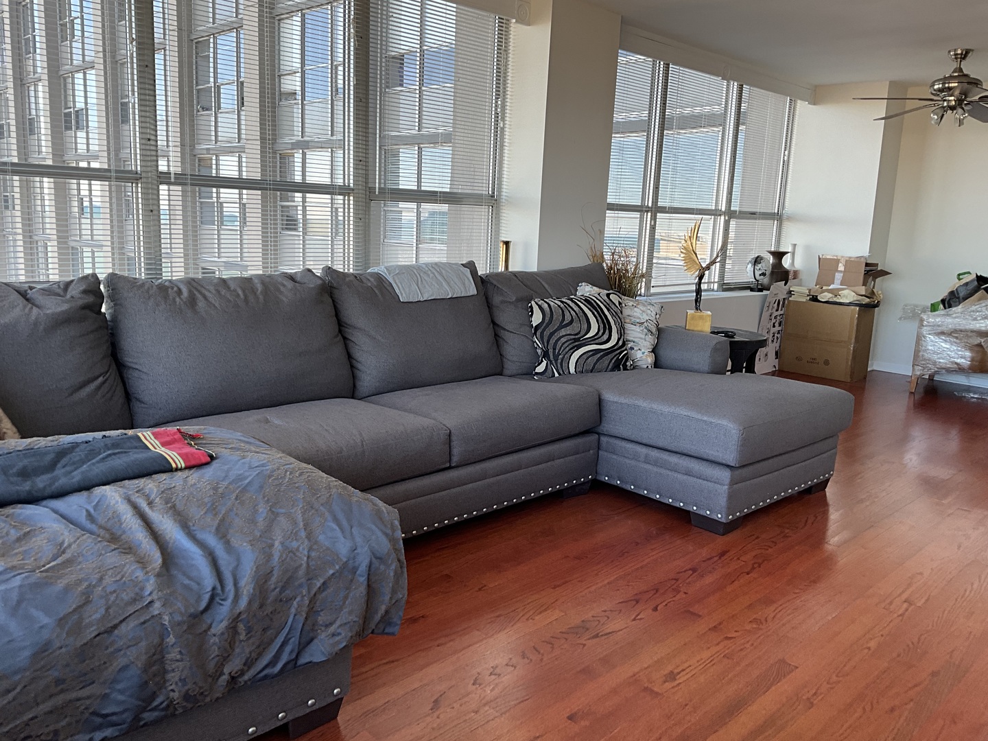 655 West Irving Park Road, Unit 2110 Chicago, IL 60613 - Photo 12 of 38 a living room with furniture window and wooden floor