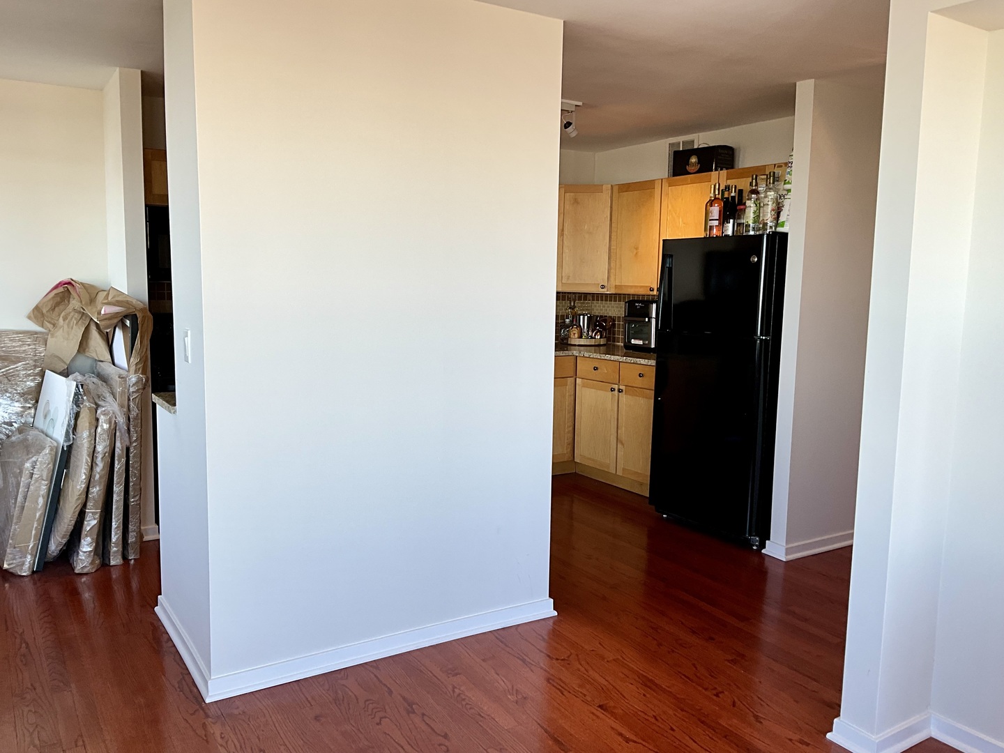 655 West Irving Park Road, Unit 2110 Chicago, IL 60613 - Photo 13 of 38 a view of a hallway with wooden floor