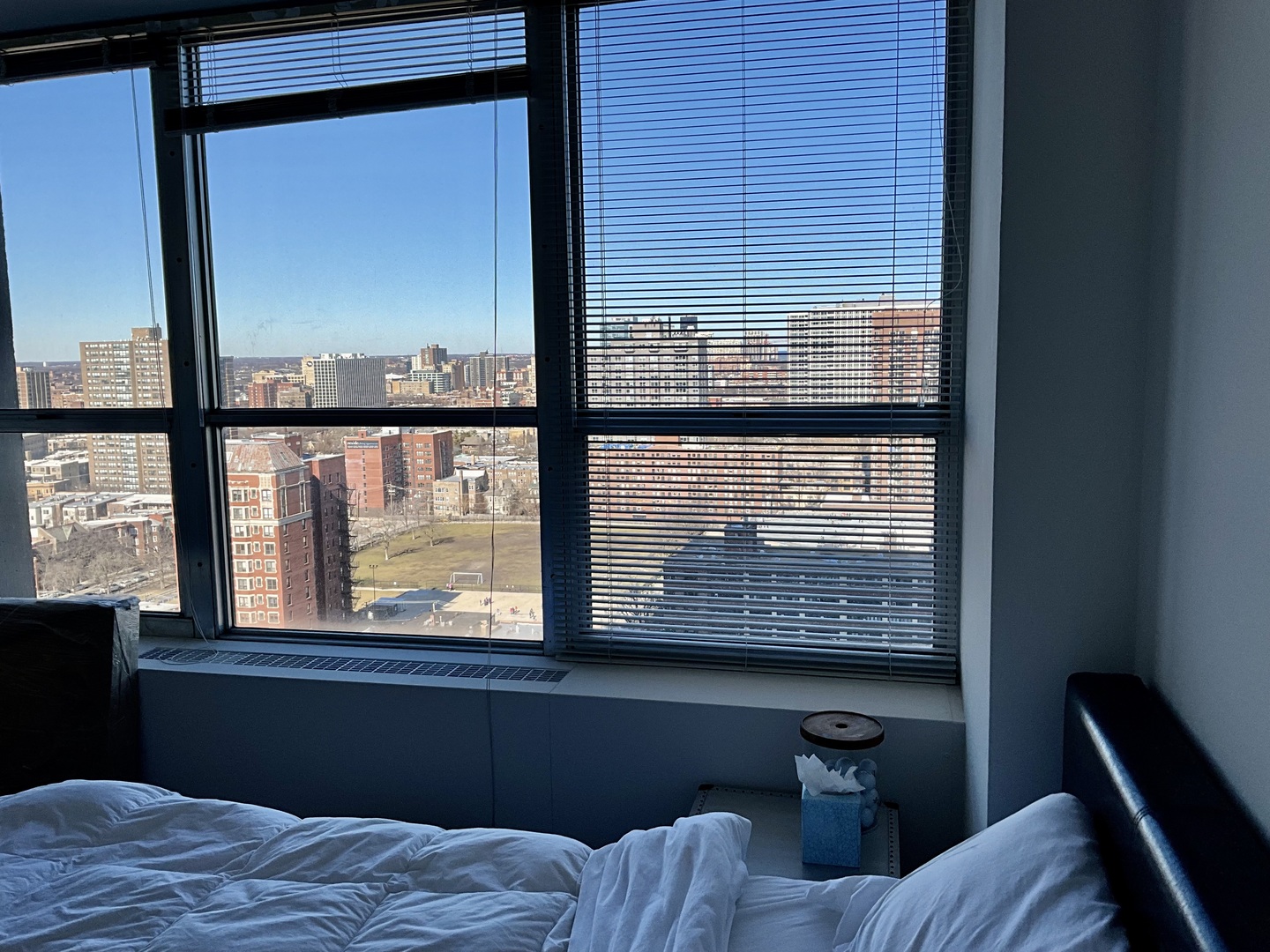 655 West Irving Park Road, Unit 2110 Chicago, IL 60613 - Photo 20 of 38 a view of a room with furniture and windows