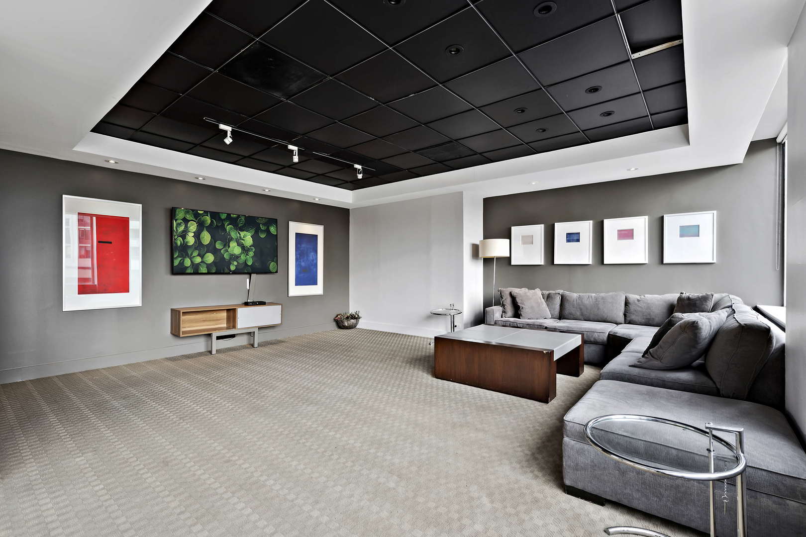 655 West Irving Park Road, Unit 2110 Chicago, IL 60613 - Photo 26 of 38 a living room with furniture a window and a flat screen tv