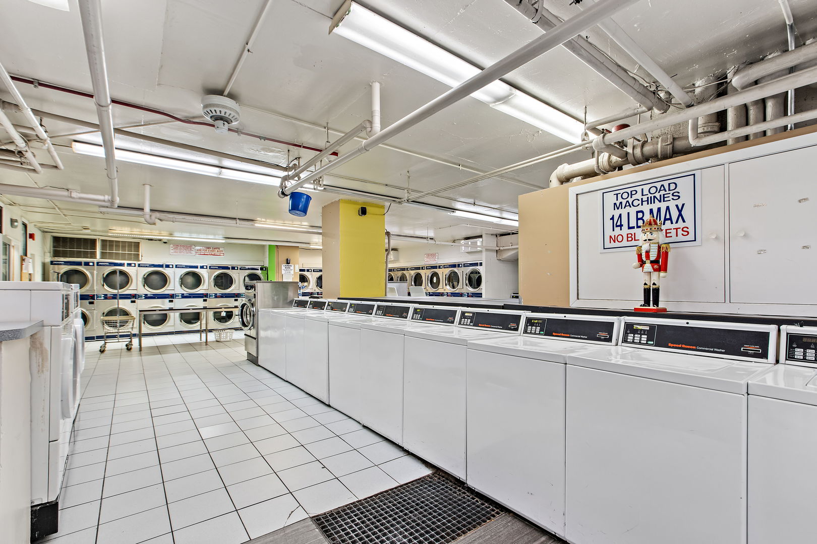 655 West Irving Park Road, Unit 2110 Chicago, IL 60613 - Photo 31 of 38 a kitchen with a sink and cabinets