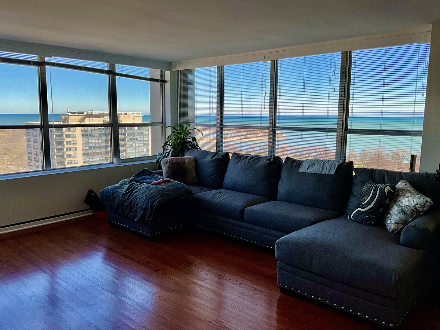 655 West Irving Park Road, Unit 2110 Chicago, IL 60613 - Photo 10 of 38 a living room with furniture and a large window