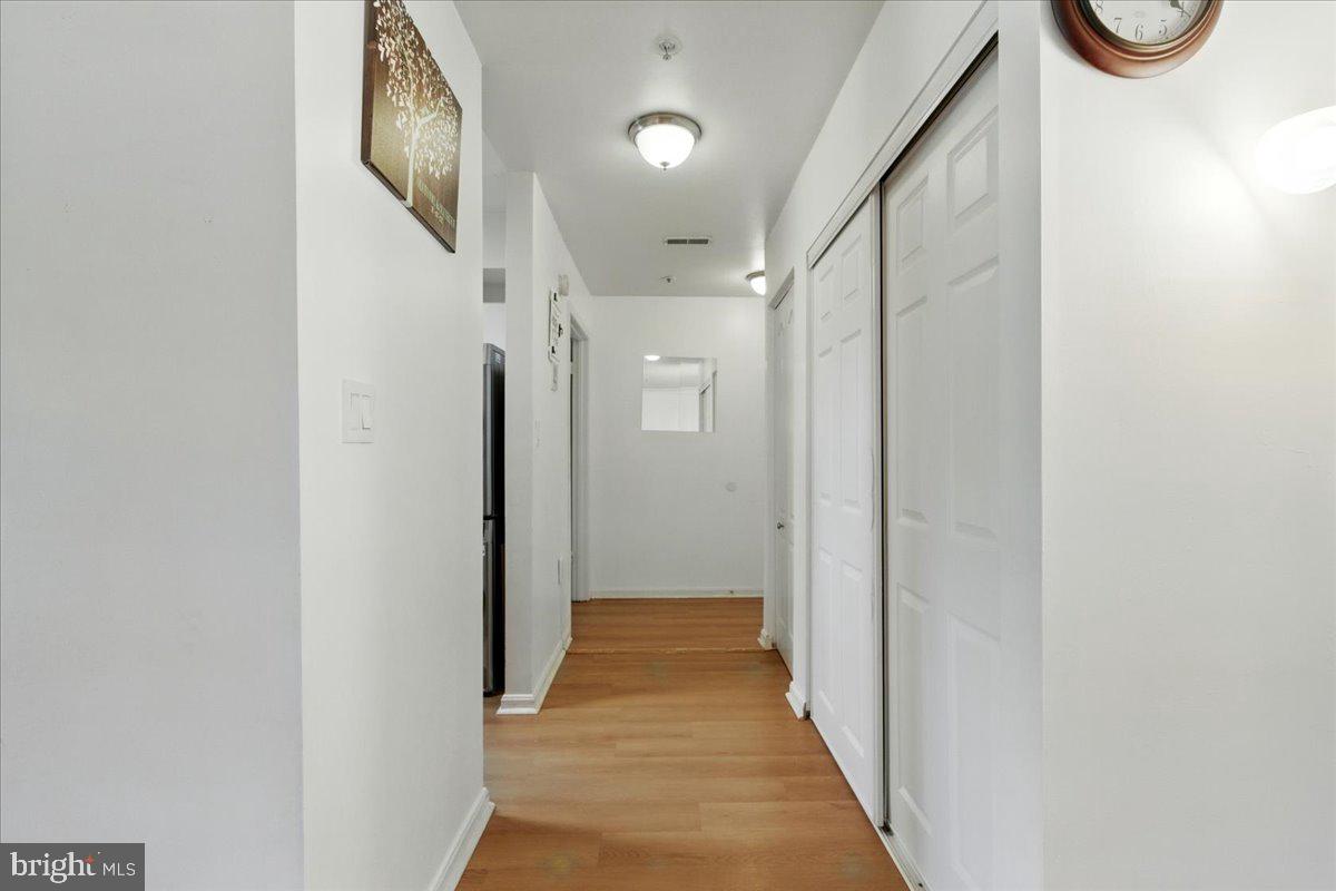 8384 Montgomery Run Road, Unit B Ellicott City, MD 21043 - Photo 15 of 31 View from the primary bedroom to foyer.