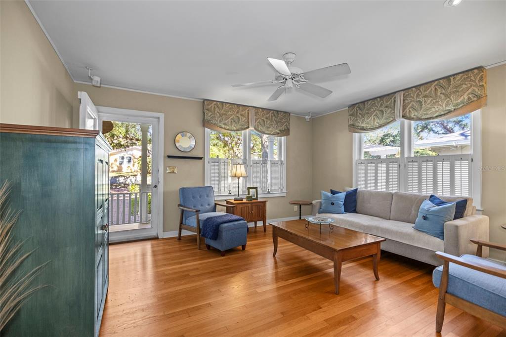 637 Scotland Street Dunedin, FL 34698 - Photo 16 of 72 a living room with furniture and a large window