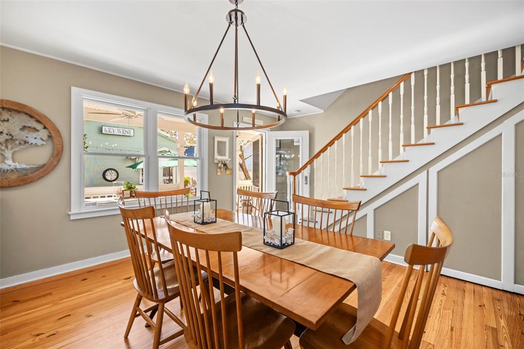 637 Scotland Street Dunedin, FL 34698 - Photo 17 of 72 a view of a dining room with furniture window and wooden floor