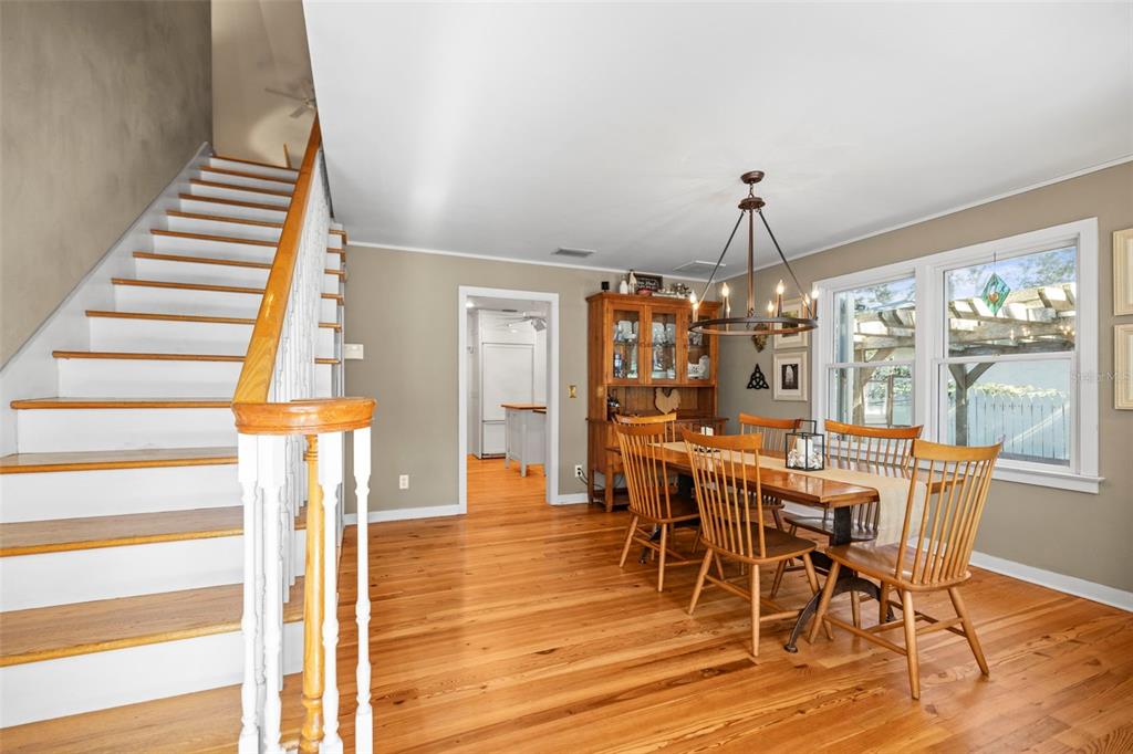 637 Scotland Street Dunedin, FL 34698 - Photo 32 of 72 a view of a dining room with furniture window and wooden floor