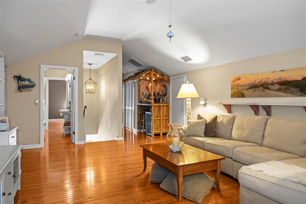637 Scotland Street Dunedin, FL 34698 - Photo 35 of 72 a living room with furniture and a large window