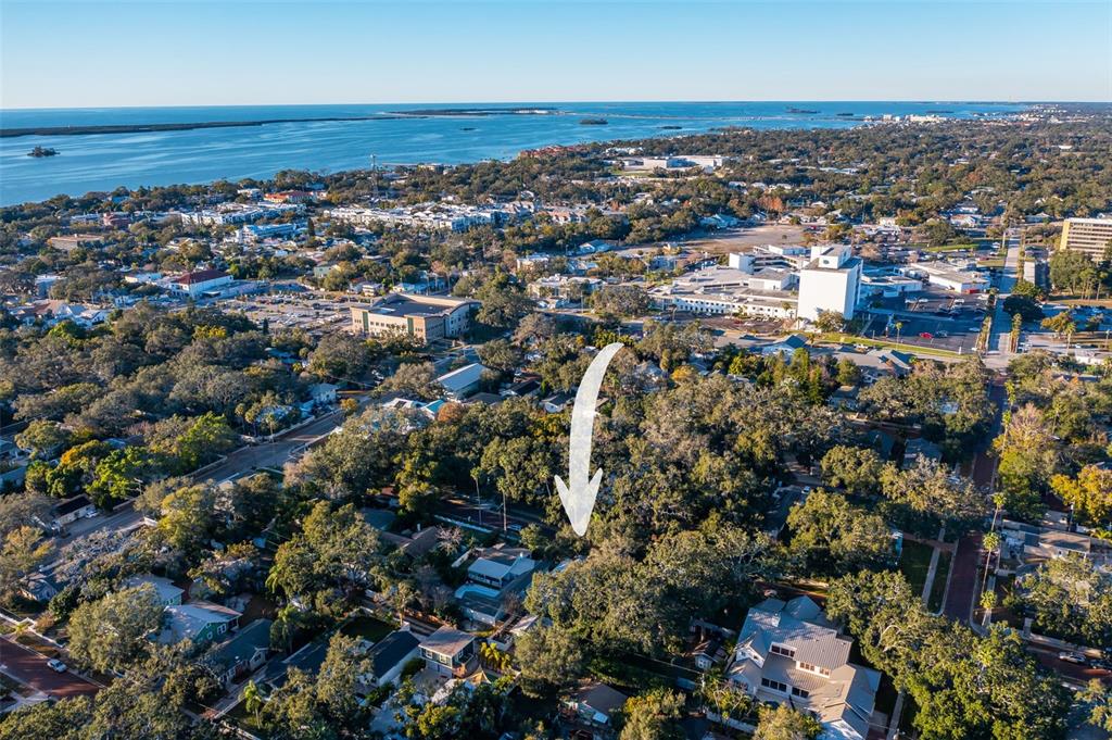 637 Scotland Street Dunedin, FL 34698 - Photo 39 of 72 an aerial view of a city with lots of residential buildings and mountain view in back