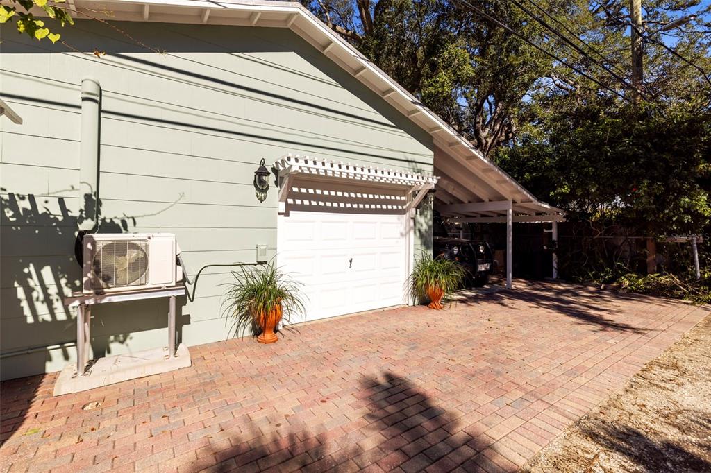 637 Scotland Street Dunedin, FL 34698 - Photo 45 of 72 a view of a house with a patio