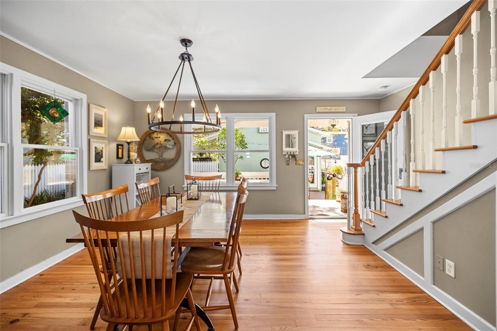 637 Scotland Street Dunedin, FL 34698 - Photo 5 of 72 a view of a dining room with furniture window and wooden floor