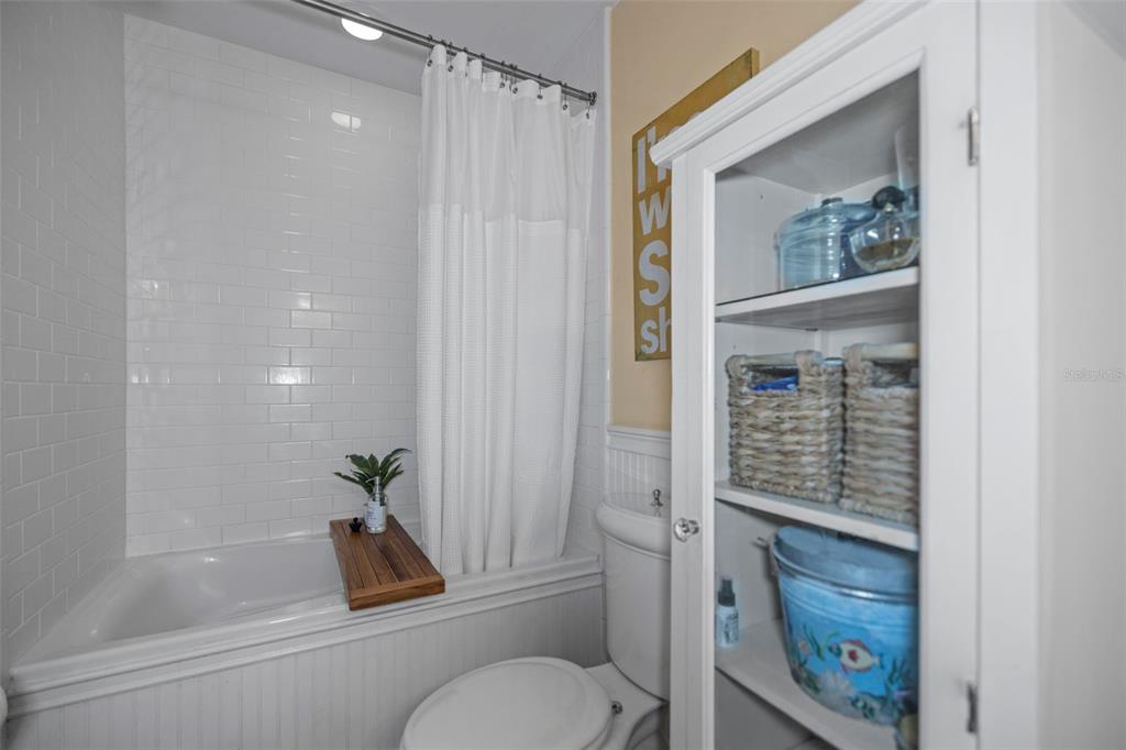 637 Scotland Street Dunedin, FL 34698 - Photo 55 of 72 a bathroom with a toilet and a shower