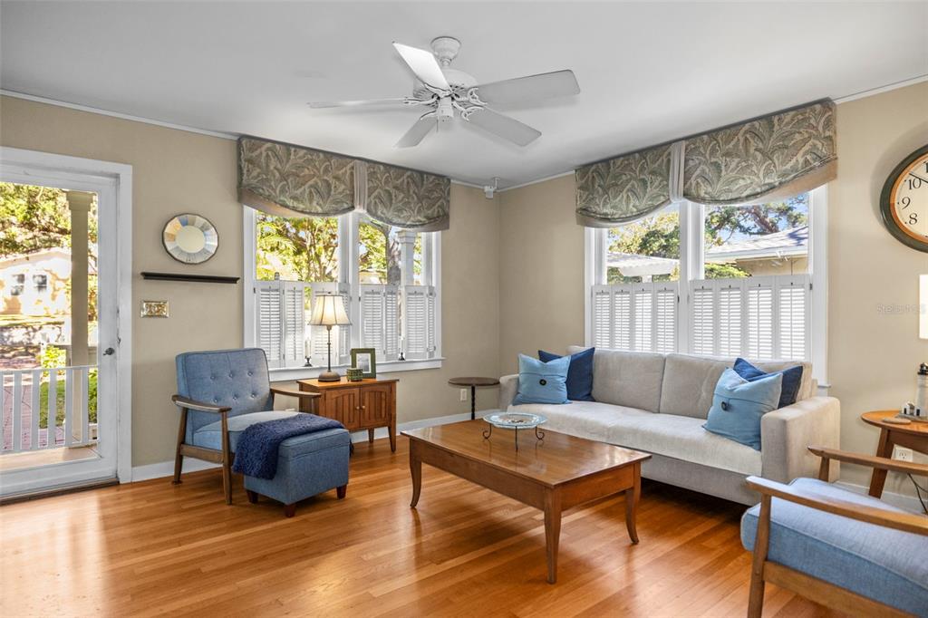 637 Scotland Street Dunedin, FL 34698 - Photo 8 of 72 a living room with furniture and a large window