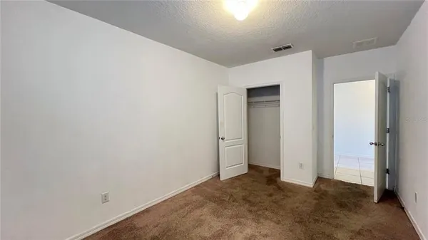 an empty room with closet