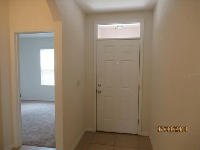 an empty room with a window