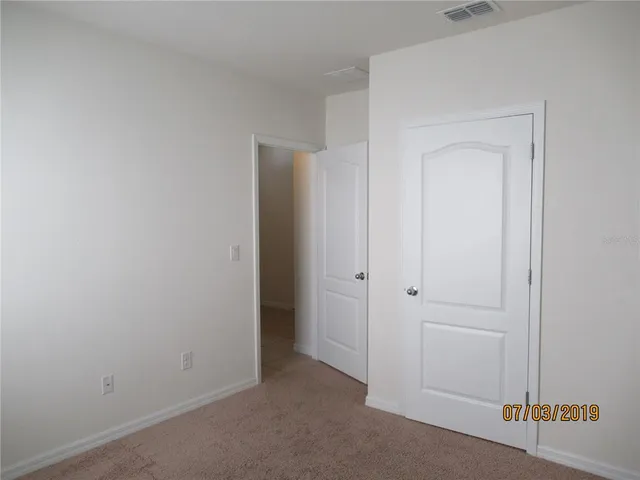 a view of a hallway with a elevator