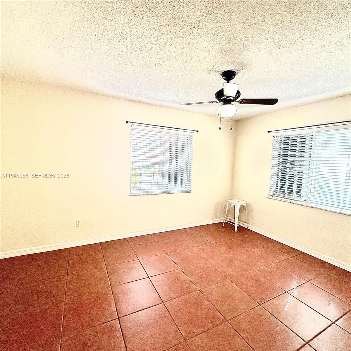 11900 Southwest 6th Street, Unit 2 Miami, FL 33144 - Photo 13 of 14 a view of an empty room with a window