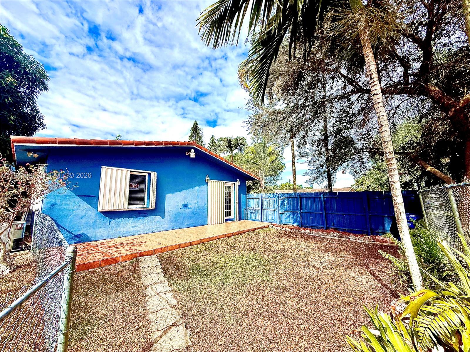 11900 Southwest 6th Street, Unit 2 Miami, FL 33144 - Photo 2 of 14 a view of house with yard