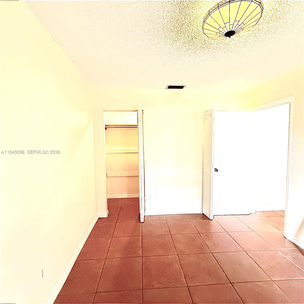 11900 Southwest 6th Street, Unit 2 Miami, FL 33144 - Photo 10 of 14 a picture of a room