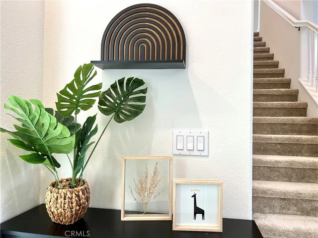 a vase of flowers sitting on a table