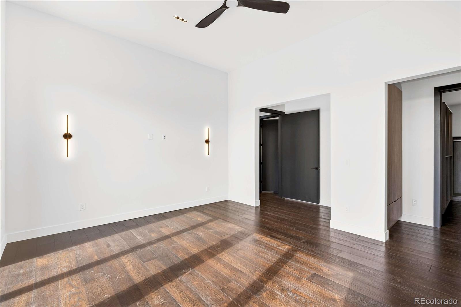 545 Strada Rossa Road Golden, CO 80401 - Photo 12 of 49 a view of an empty room and wooden floor