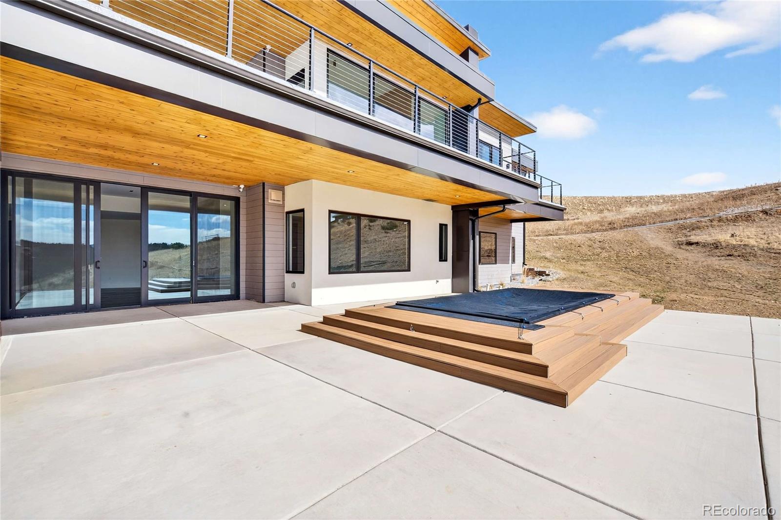 545 Strada Rossa Road Golden, CO 80401 - Photo 34 of 49 a view of a building with stairs and windows